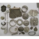 Small silver and white metal items of personal ornament: to include Celtic brooches and belt