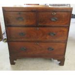 A mid 19thC string and ebony inlaid mahogany four drawer dressing chest,