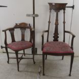 An Art Nouveau mahogany and marquetry chair, decorated with organic designs, having a high back,