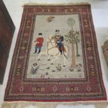 A pictorial rug, depicting a soldier on horseback, bordered by flora and foliage,