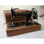 An early 20thC Singer manual sewing machine, model no.