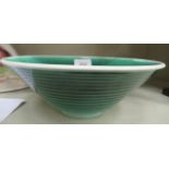A Pilkingtons Royal Lancastrian ribbed green glazed pottery bowl with deep sides bears impressed