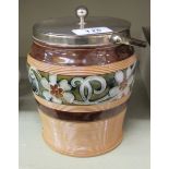 A Doulton Lambeth brown, green and blue glazed stoneware biscuit barrel,