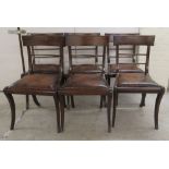 A set of six Regency mahogany framed, twin bar back dining chairs,