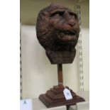 A 20thC carved oak lion mask,