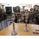 A pair of late 19thC elaborately cast silver plated on copper, three part,