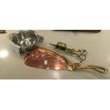 An Art Nouveau copper and brass crumb scoop; a pair of brass candle trimmer scissors;