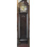 An early 20thC oak longcase clock, the round arched hood with flank pillars,