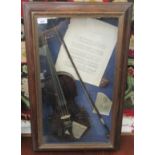 A 19thC musician's glazed, box display, comprising a violin, bow,
