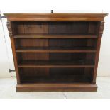A late Victorian mahogany open front dwarf bookcase with three shelves,