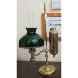 An early 20thC brass table-top carbide lamp with a height adjustable frame and later shade BS