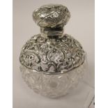 A late Victorian slice and hobnail cut glass spherical dressing table bottle,