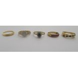 Five variously set 9ct gold and gold coloured metal rings 11