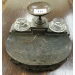 An early 20thC cast and patinated bronze deskstand,