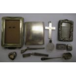 Silver and white metal collectables: to include a cigarette case; a crucifix pendant;