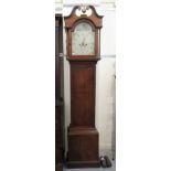A late 18th/early 19thC oak longcase clock with a swan neck pediment and a waisted trunk,