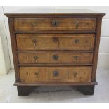A William & Mary and later walnut dressing chest with four graduated drawers,