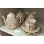 Four pieces from an early 20thC Japanese earthenware tea set OS6