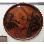 A 19thC Japanese turned and stained wooden charger,