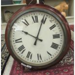 An early 20thC turned mahogany cased wall timepiece,