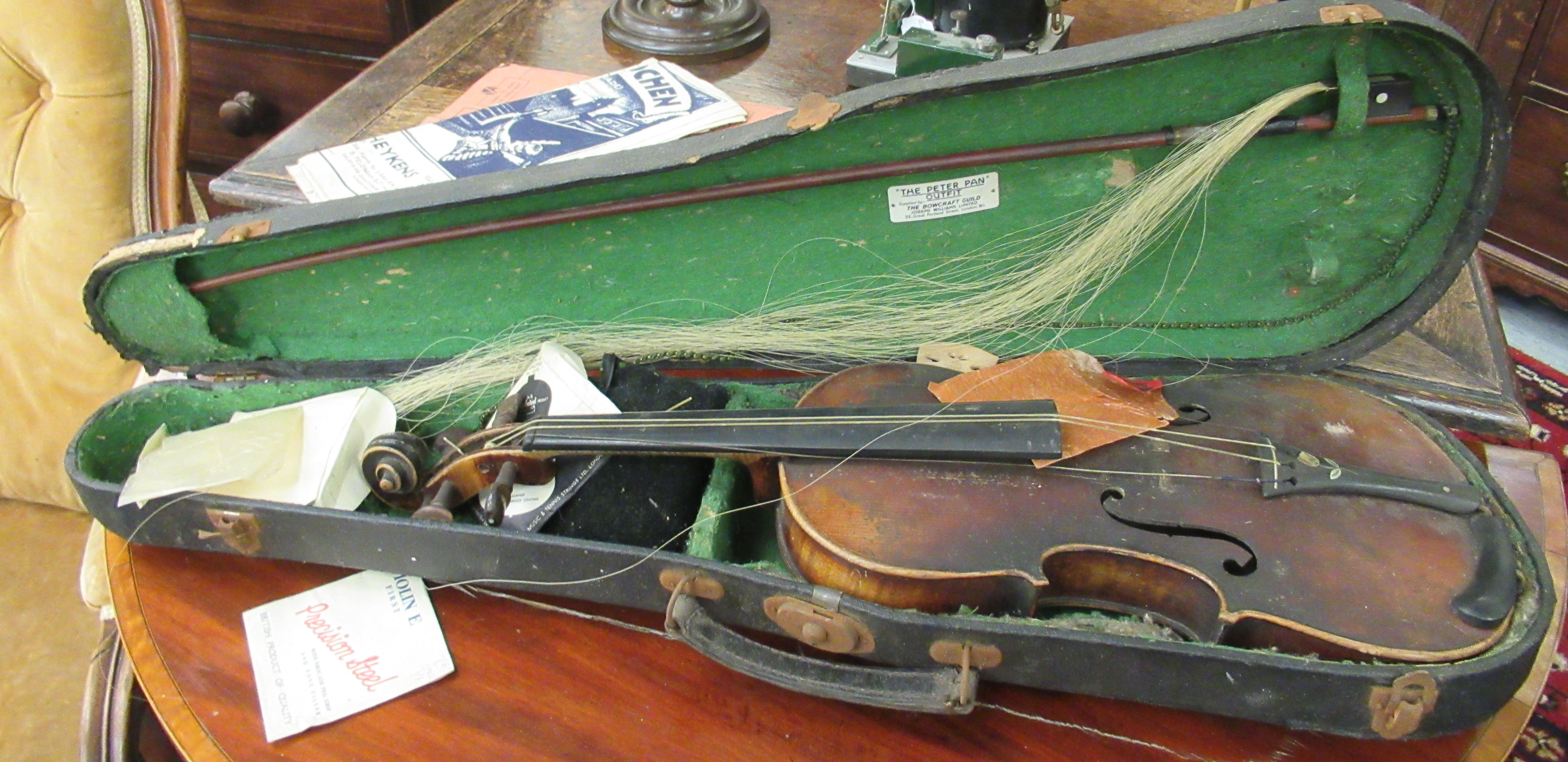 A late 19thC German violin with a two piece back and inlaid purfled edge the bow 13''L bears a