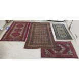 Four rugs: to include a Chinese example,