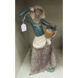 A Lladro porcelain figure,