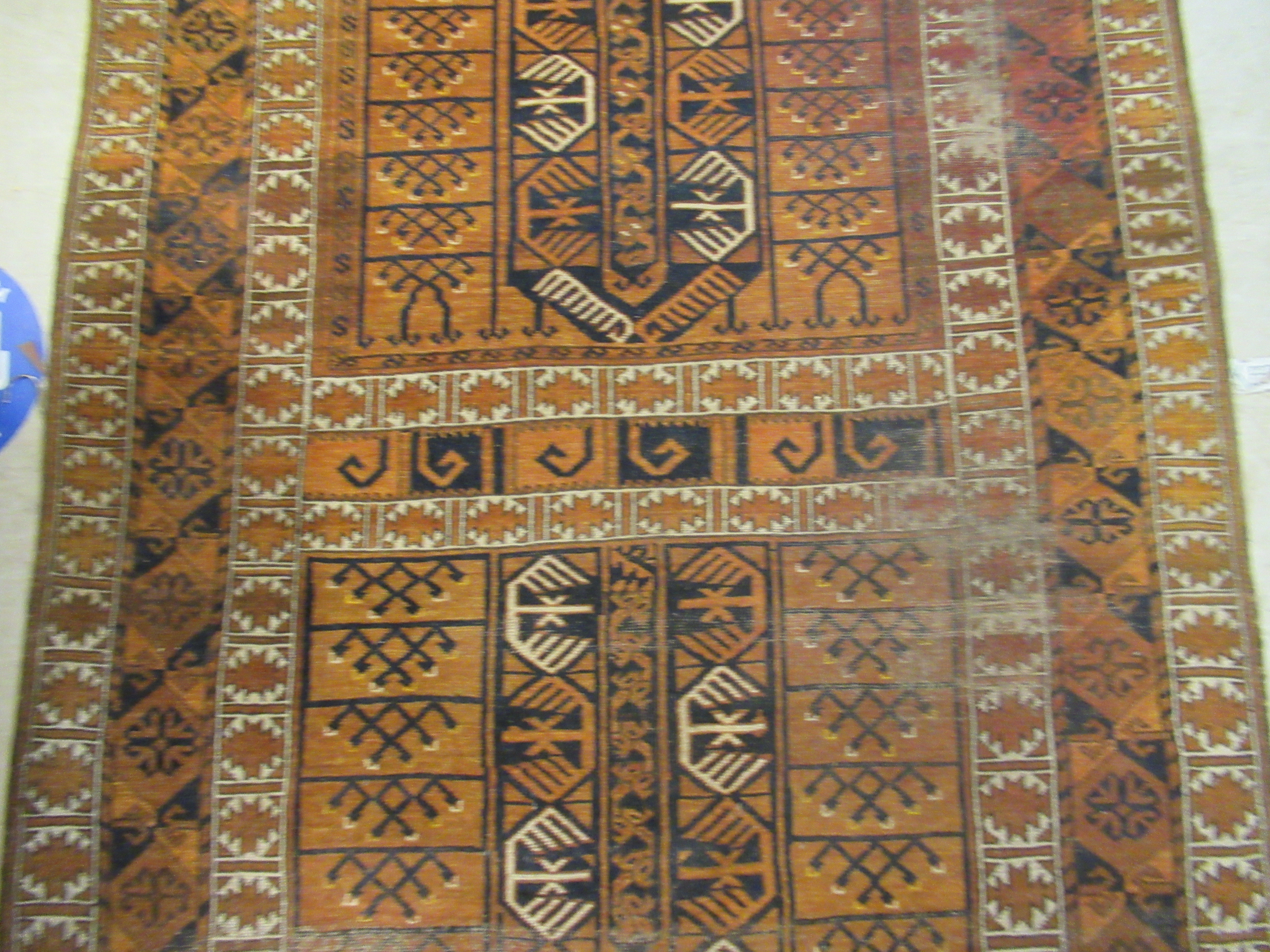 A Caucasian rug, decorated with repeating stylised designs, - Image 2 of 4