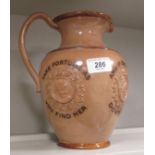 A Royal Doulton brown glazed stoneware promotional jug of baluster form,