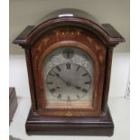 An Edwardian satinwood inlaid mahogany bracket clock;