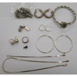 A quantity of silver and other items of personal ornament: to include bangles and earrings