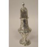 An Edwardian silver pedestal vase design caster of wrythen moulded,