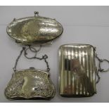 Three dissimilar late 19th/early 20thC silver folding purses, variously embossed,