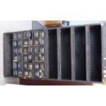 A mid 20thC painted steel, modular industrial cabinet comprising eight stacking sections,