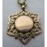 A 9ct gold floral design pendant,