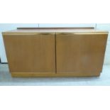 A McIntosh teak sideboard with two doors,