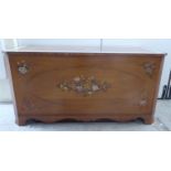 An early 20thC string inlaid and floral painted satin mahogany blanket chest with straight sides