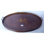 An Edwardian marquetry string inlaid mahogany, oval twin handled serving tray with a low,