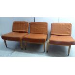 A set of three Swedish Folke Ohlsson design beech framed slipper chairs,