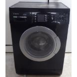 A Bosch Exxcel 7 washing machine 33''h 23.