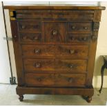 A mid Victorian Scottish inspired mahogany dressing chest with an arrangement of eight drawers,