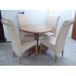 A modern beech drop leaf pedestal table 29''h 35''L 34''L;