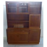 A G-Plan, two part, teak living room unit, comprising open and glazed shelves,