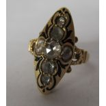 A yellow metal marquise shaped ring,