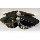 Four various coloured and braided German Luftwaffe peaked visor caps with emblems (Please Note: