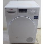 A Bosch condenser tumble dryer 33''h 23.