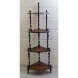 A late Victorian satinwood inlaid walnut four tier whatnot with spiral turned pillar uprights