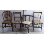 Four early 20thC chairs: to include an Edwardian string inlaid mahogany corner chair BSR