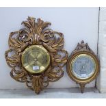 Two 20thC barometers, faced by brass and steel dials,