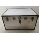 A 20thC stud and hide bound metal cabin trunk 22''h 40''w U